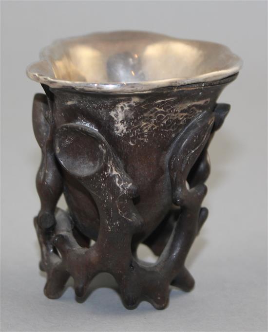 A Chinese rosewood libation cup, 17th / 18th century, 8cm, some losses and repair